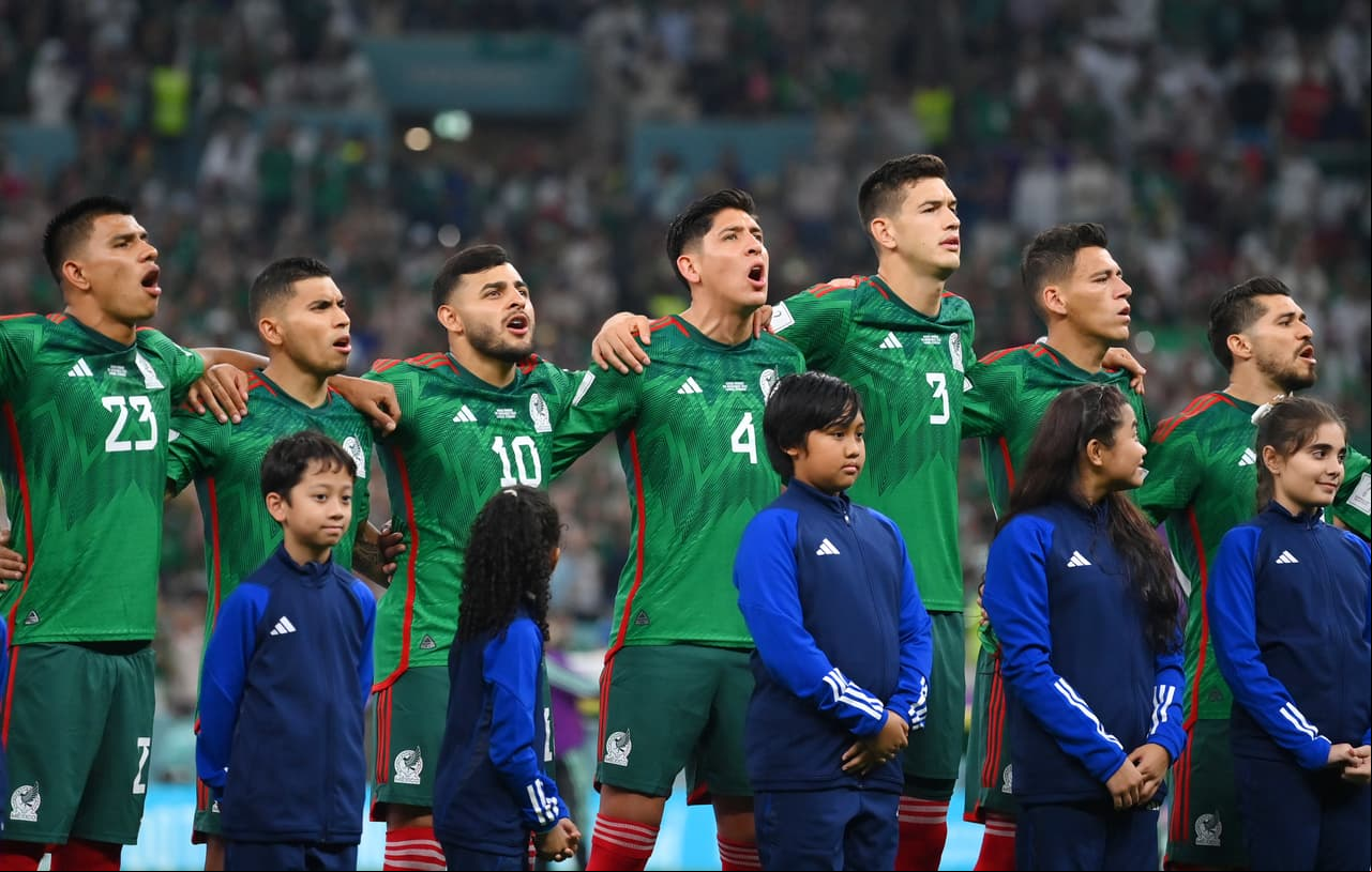 LUSAIL CITY, QATAR - NOVEMBER 30: Mexico players line up for the national anthem prior to the FIFA World Cup Qatar 2022 Group C match between Saudi Arabia and Mexico at Lusail Stadium on November 30, 2022 in Lusail City, Qatar. (Photo by Justin Setterfield/Getty Images)